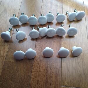 White ceramic cabinet handles/knobs